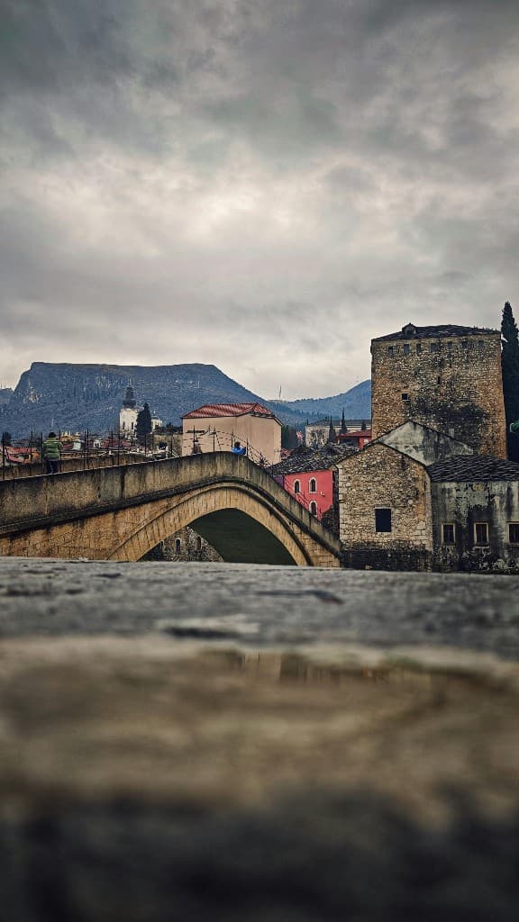 Stari Most (Old Bridge) in Mostar, stone arch and historic buildings