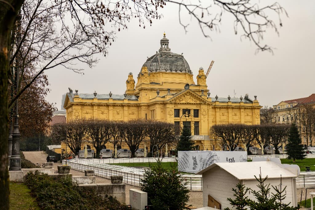 Zagreb Art Pavilion and King Tomislav Square with the winter ice rink in front of the yellow dome